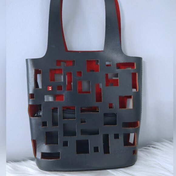 Bally Handbags - Bally leather cutout tote w/pouch EUC